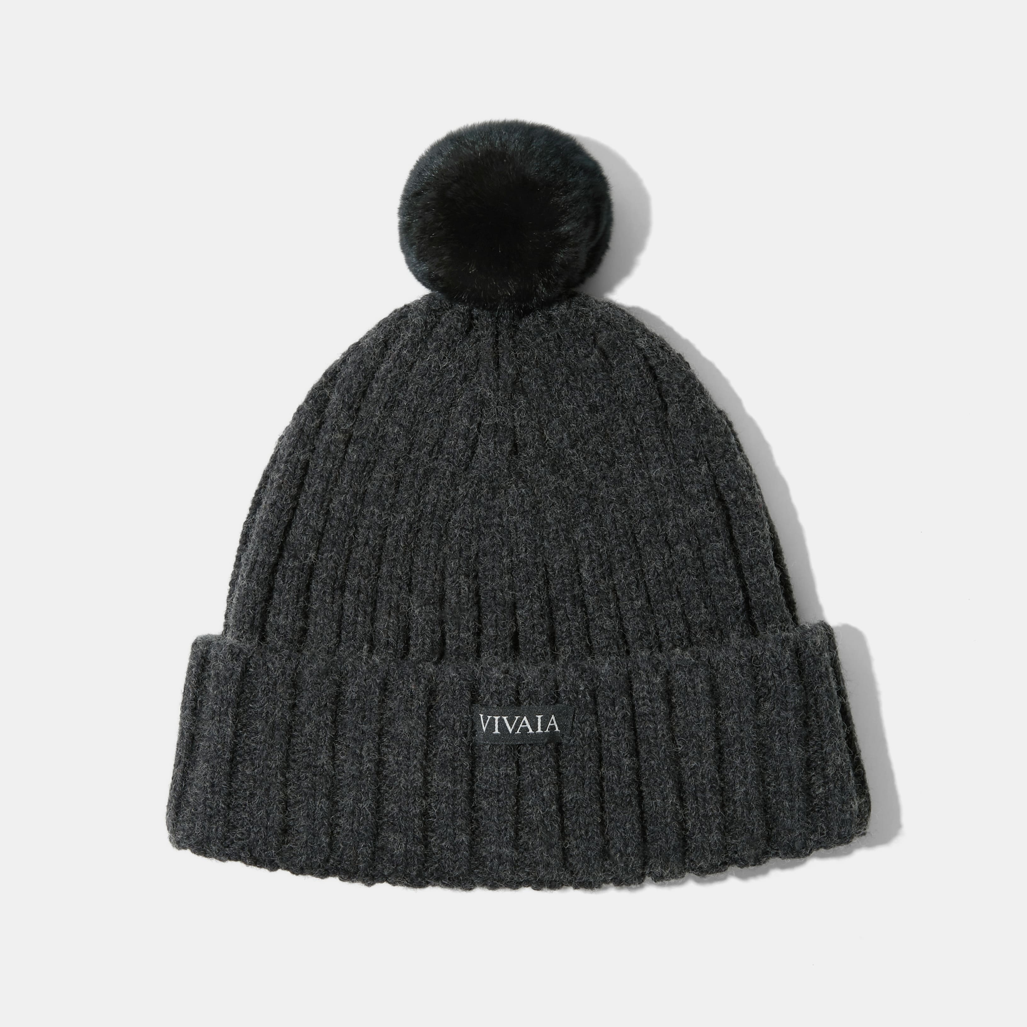 Knitted hat with removable pom pom