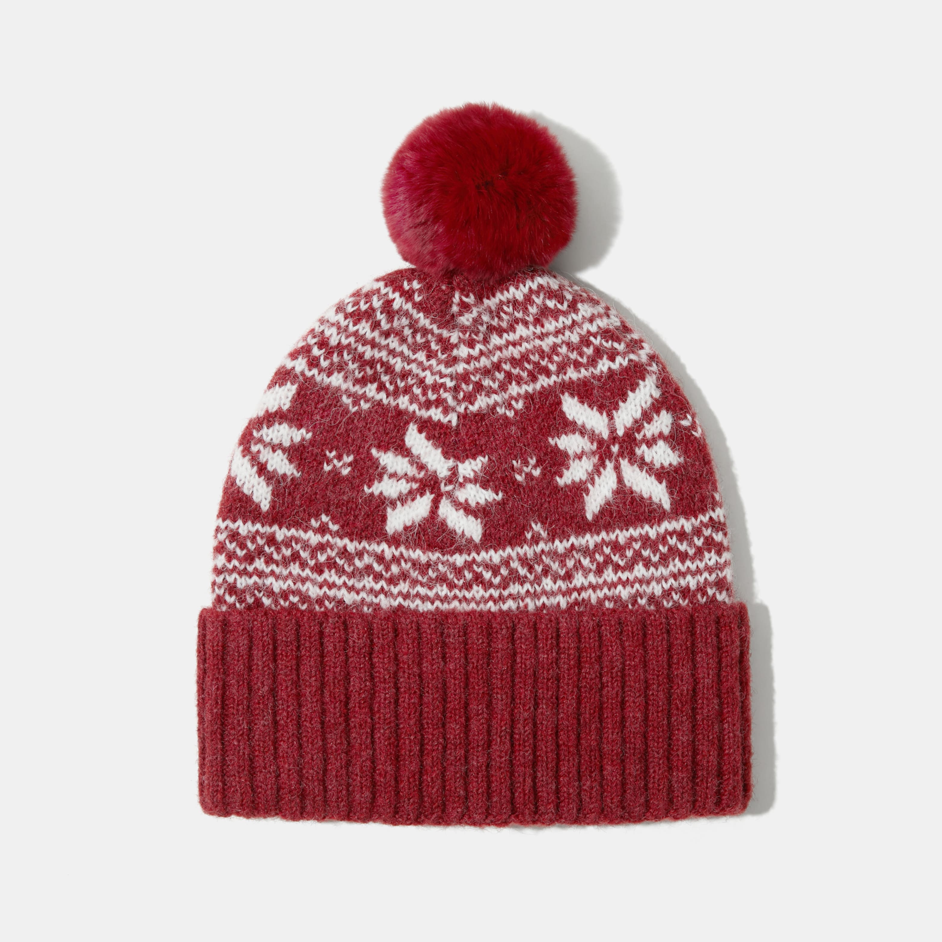 Knitted hat with removable pom pom